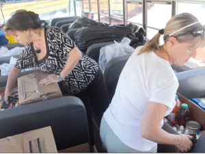 LISD transportation department fills 8 buses with items for wildfire victims